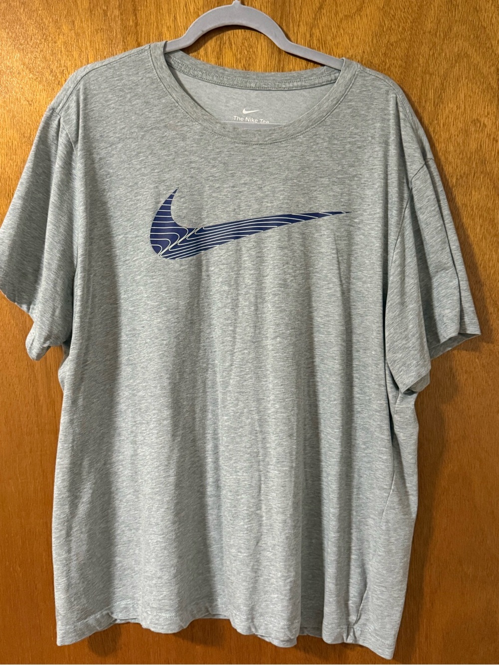 Nike Light Gray Short Sleeve Tee with Navy Patterned Swoosh